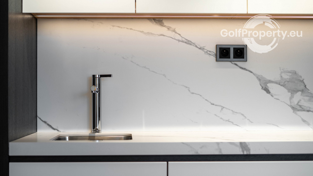 Luxury apartment by the lake with a private beach.