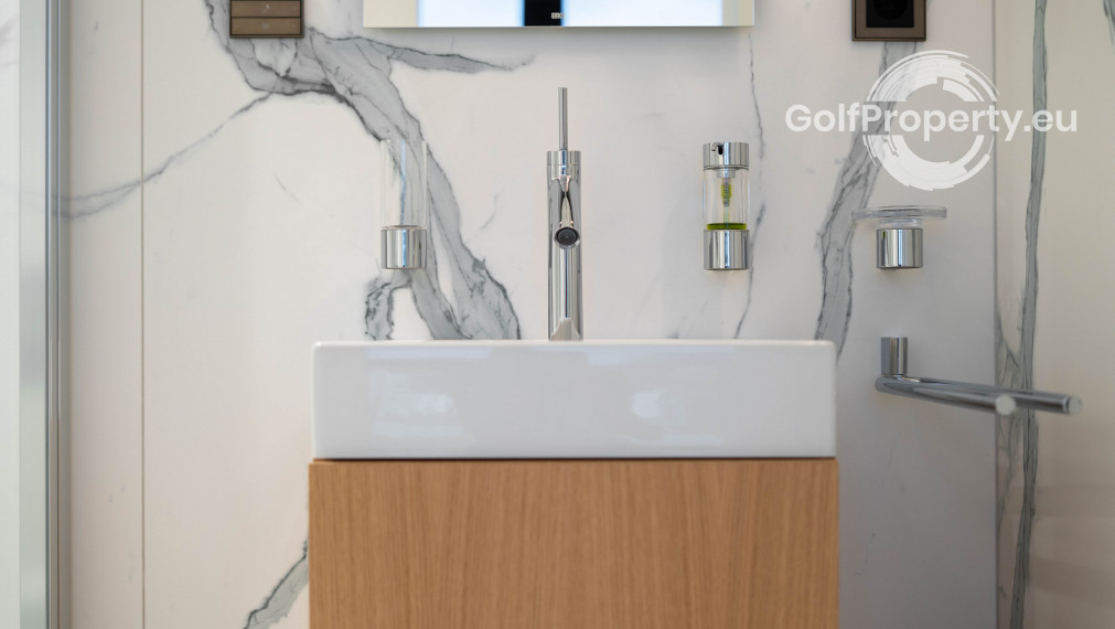 Luxury apartment by the lake with a private beach.