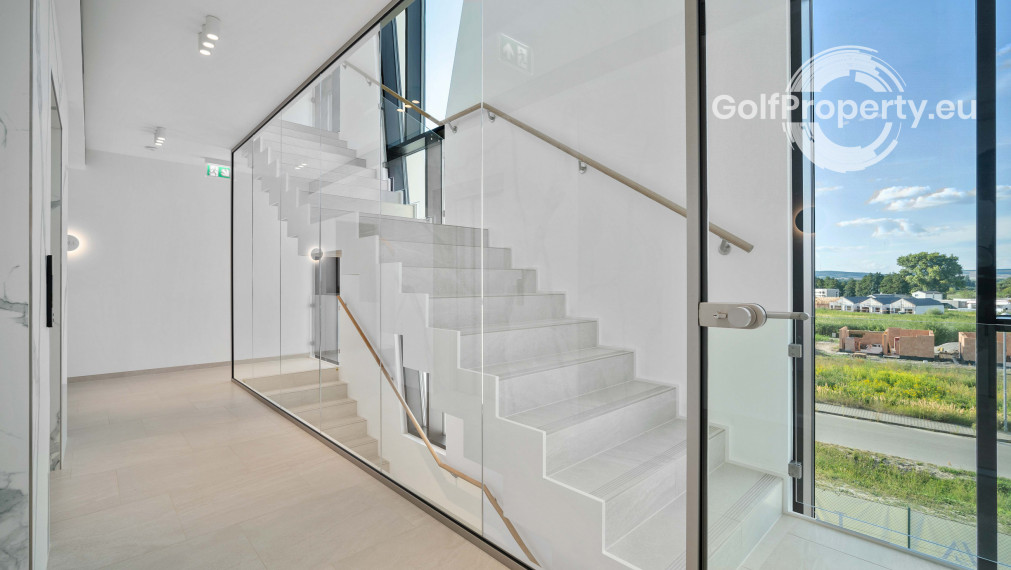 Luxury apartment by the lake with a private beach.