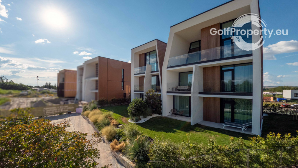 Luxury apartment by the lake with a private beach.