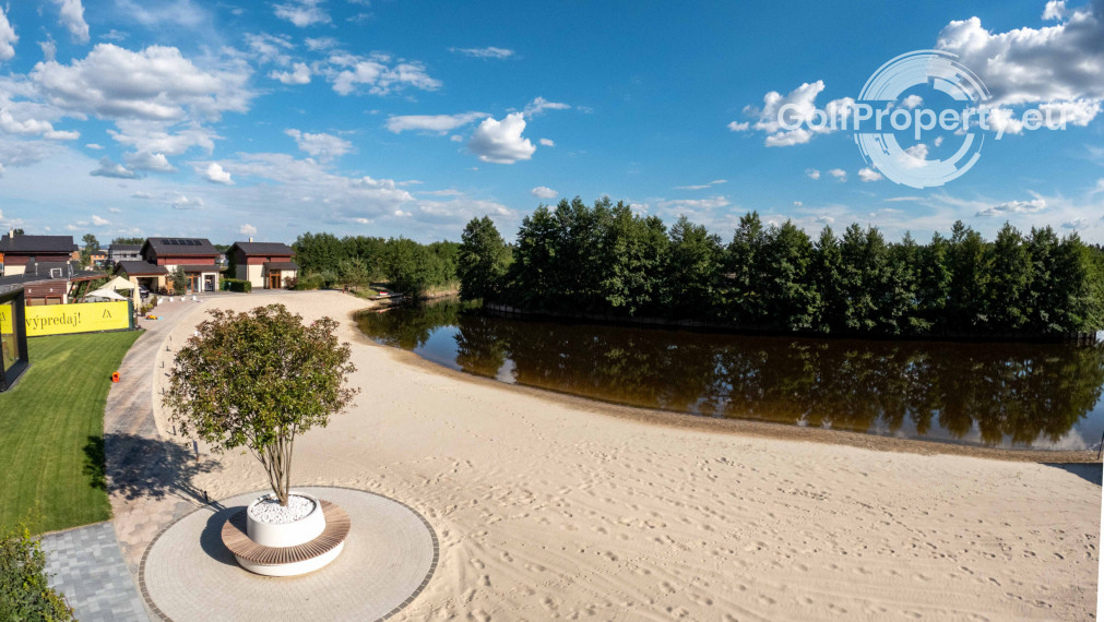 Luxury apartment by the lake with a private beach.
