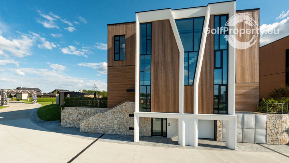 Luxury apartment by the lake with a private beach.