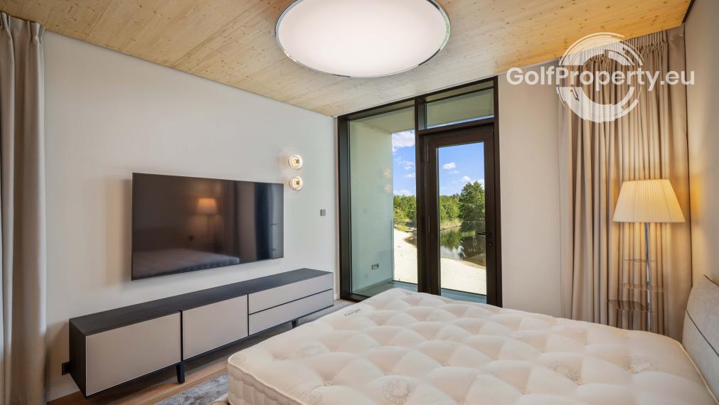 Luxury apartment by the lake with a private beach.