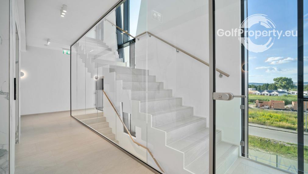 Luxury apartment by the lake with a private beach.